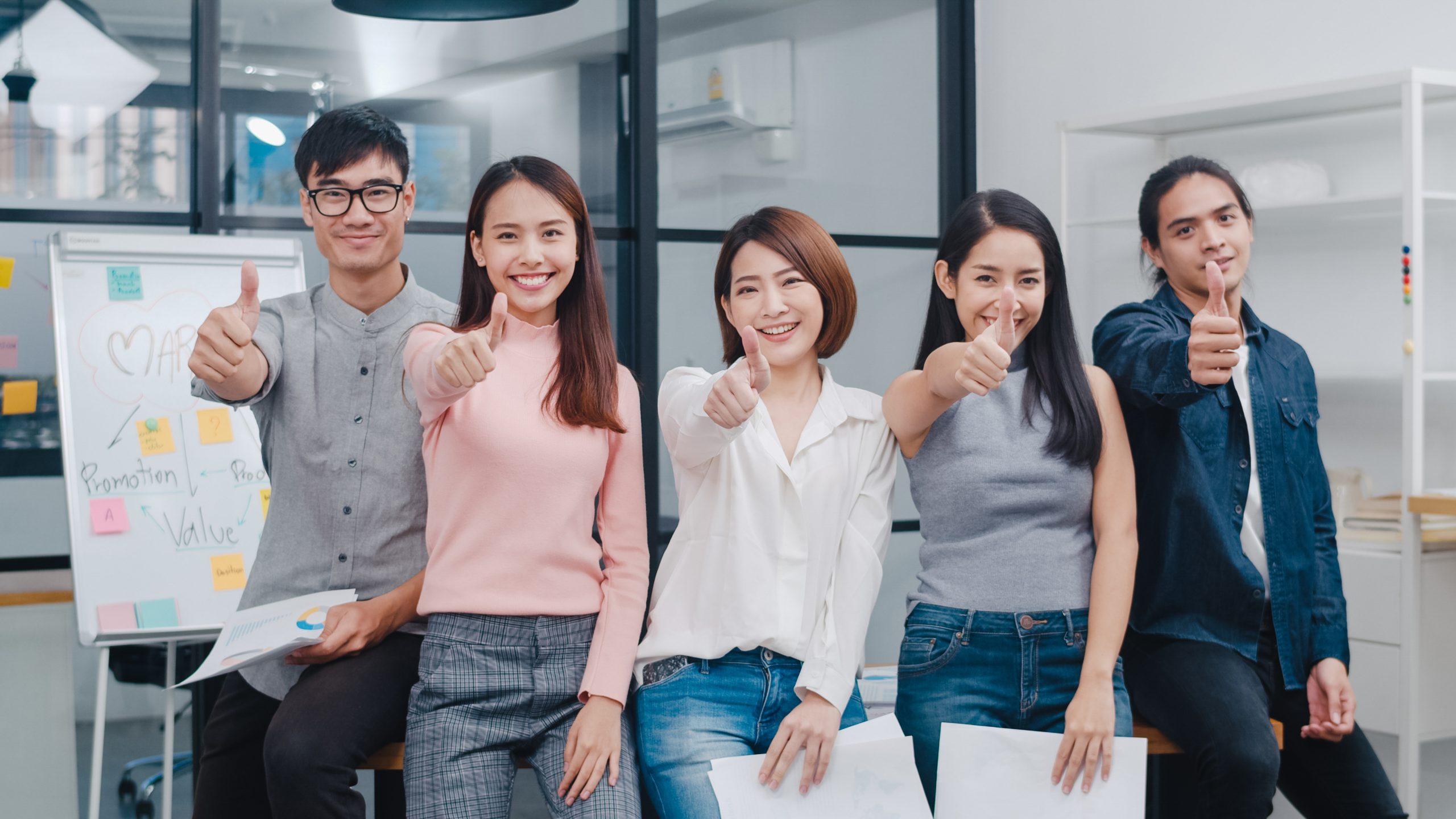 Group Of Asia Young Creative People In Smart Casual Wear Smiling