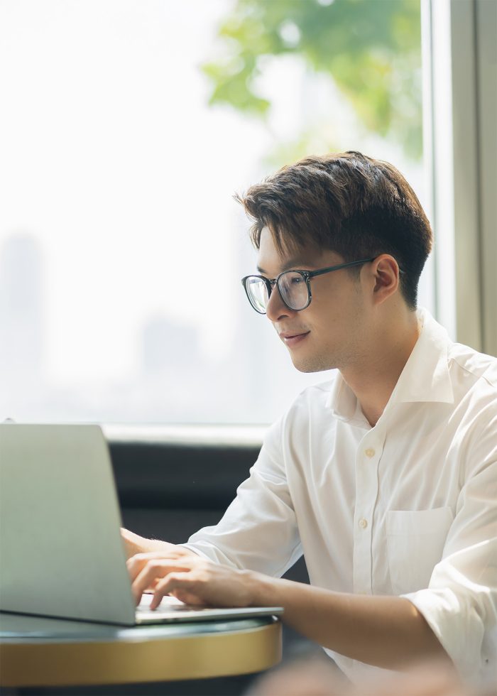 Smart Attractive Positive Asian Business Male Wearing Glasses Work Remote New Normal Lifestyle Hand Use Laptop Tele Conference Onlive Videocall Meeting Remote Business Ideas Concept 1735817141 700x9 1737522577