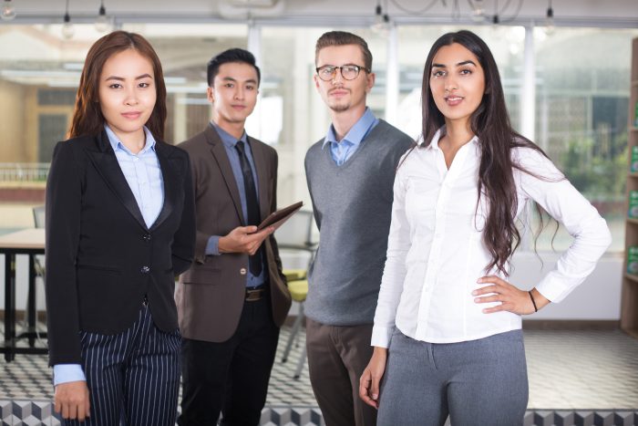 Confident Young Business Team Of Four People