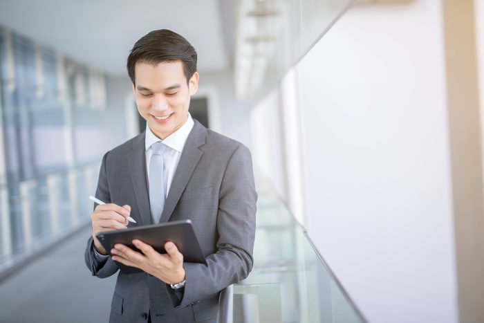 Portrait Confident Modern Young Asian Businessman Wear Black Suit Hand Holding Digital Tablet (1) 1730968302